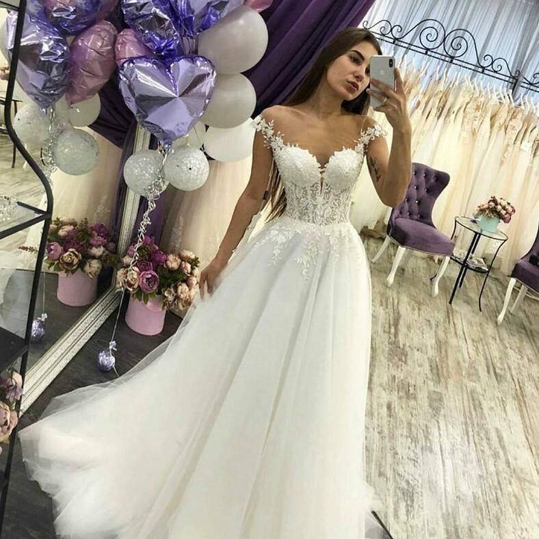 virmuze exhibit Abiti da sposa poco costosi logo main