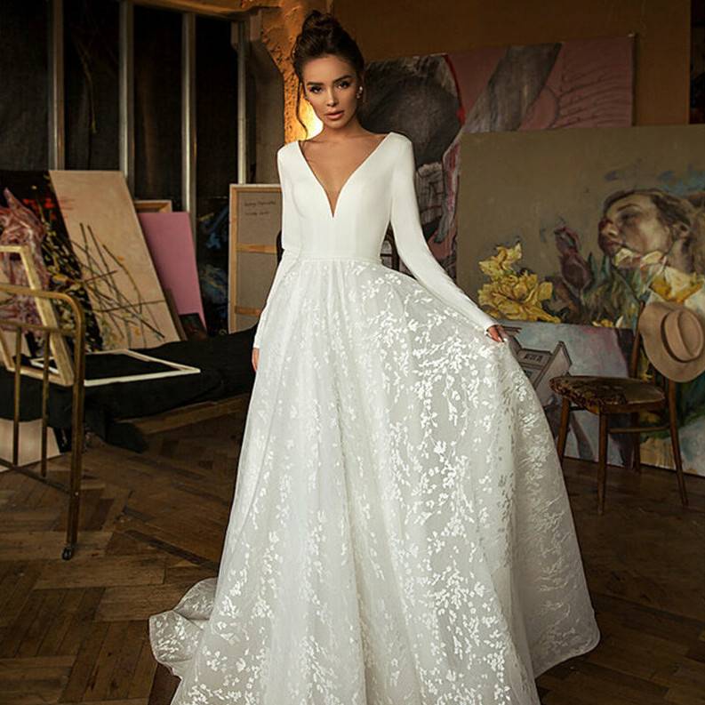 virmuze exhibit Abiti da sposa minimalisti: eleganza nel minimalismo logo main