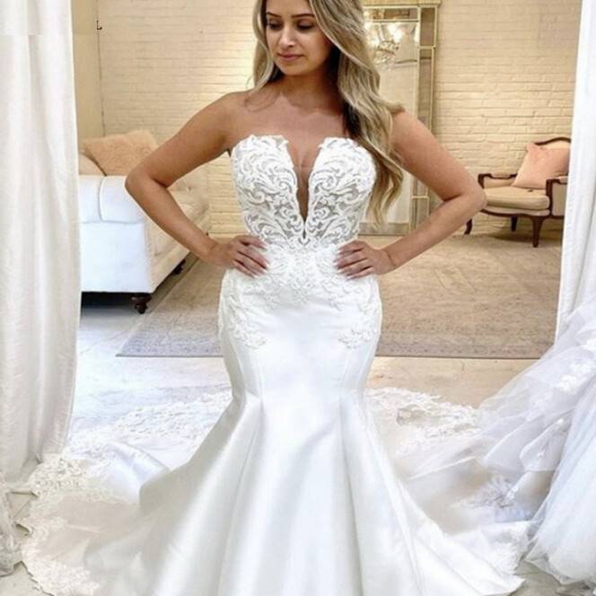 virmuze exhibit Gli abiti da sposa in pizzo sono sia da sposa che sexy! logo main