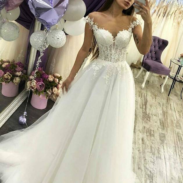 virmuze exhibit Abiti da sposa: puoi ancora avere un bell'aspetto in taglie forti logo main