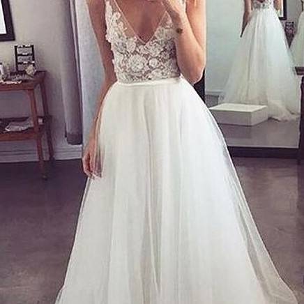 virmuze exhibit Suggerimenti per scegliere il miglior abito da sposa da spiaggia per te logo main