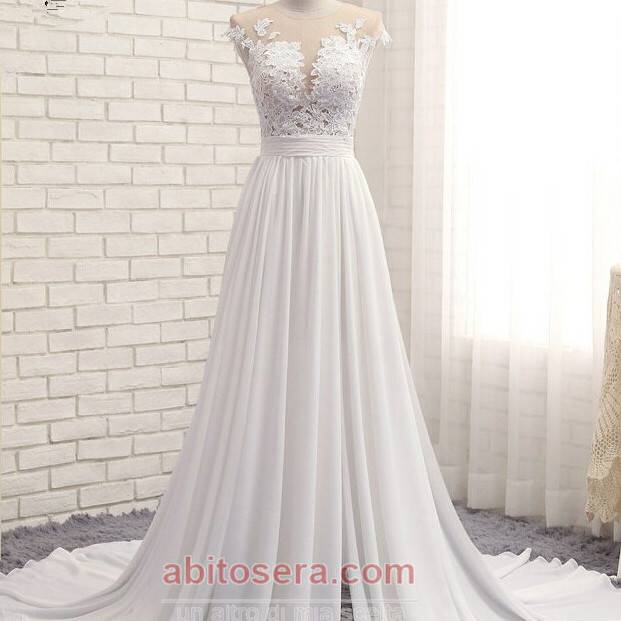 virmuze exhibit Gli abiti da sposa a trapezio soddisfano l'apprezzamento della bellezza della maggior parte delle spose moderne logo main